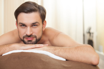 Smiling Man Lying on Stomach Smiling Man Lying on Stomach